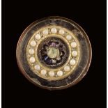 A set of five Louis XVI polished steel buttons, decorated with a seed pearl band around a