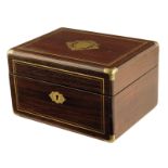 λ A 19th century French rosewood and brass inlaid toilet box, the lid inlaid with a cartouche
