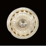 A pair of Louis XVI mother of pearl buttons, with a central paste stone, together with three similar