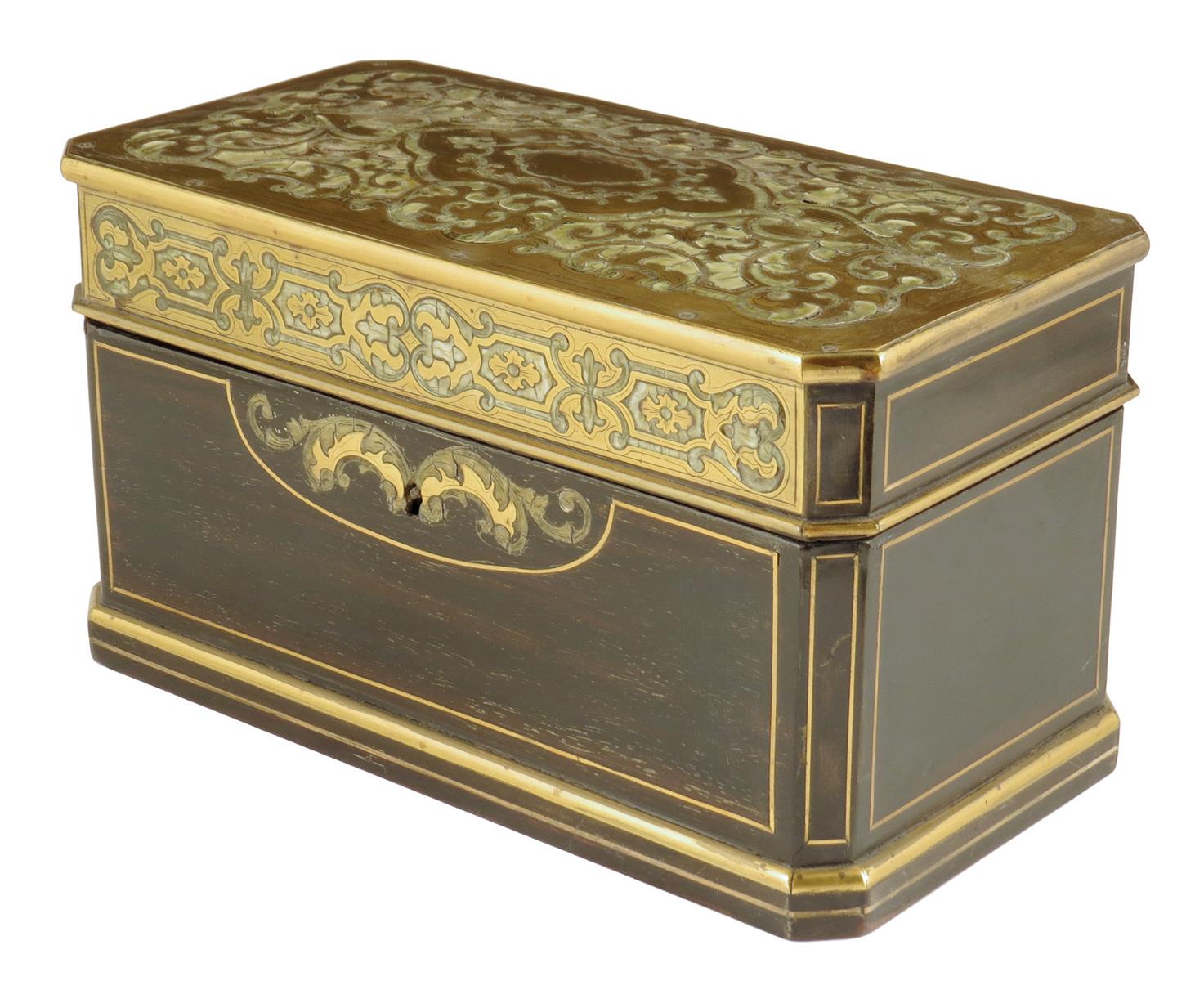 λ A 19th century French ebonized and brass boulle marquetry tea caddy, inlaid with white