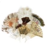A collection of nine assorted fans, comprising: two early 20th century ostrich feather examples, one