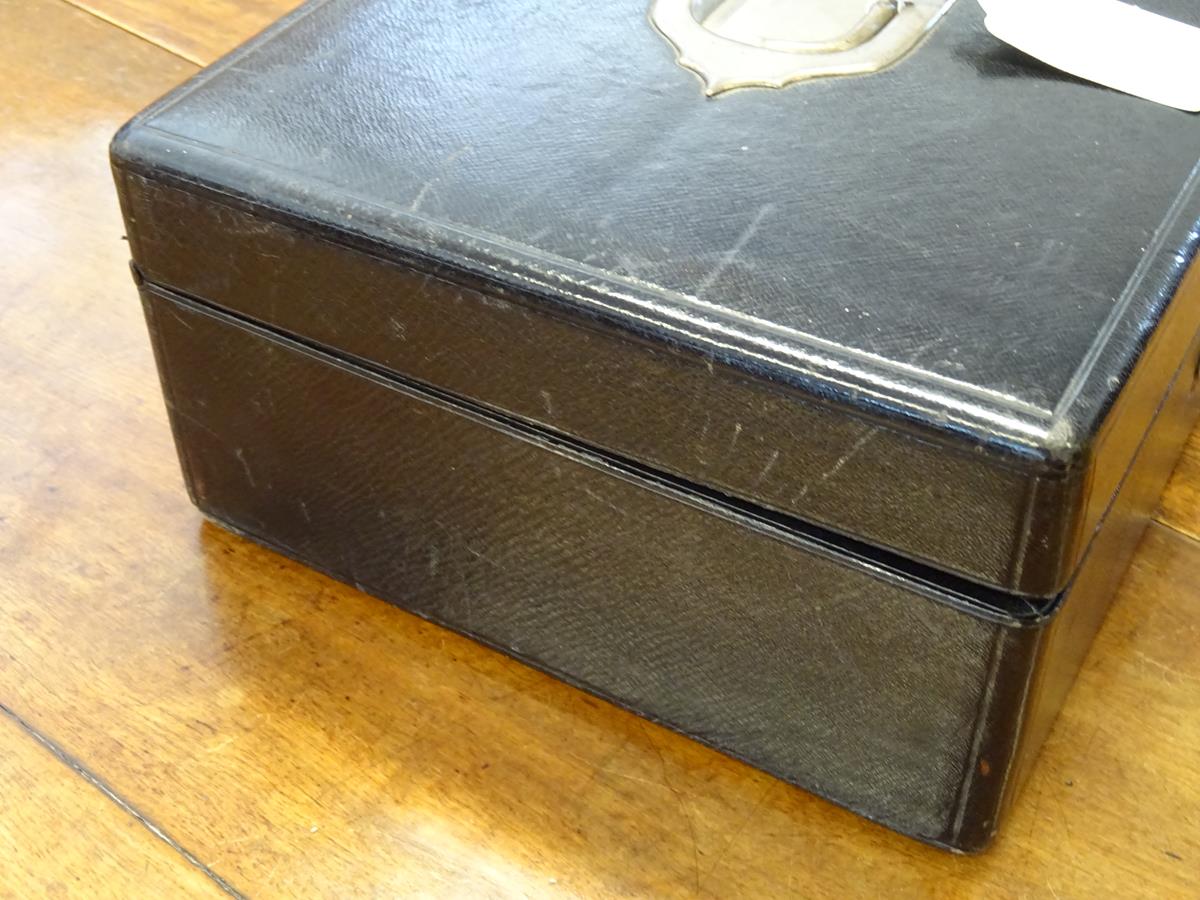 An early 20th century black leather writing box by Asprey, the hinged lid with a sunken brass handle - Image 7 of 13