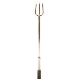 A George III toasting fork, with an ebonized shaft and plated mounts, 100.8cm long.