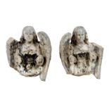 A pair of composition stone models of Medieval angels, 39cm high, 34cm wide. (2)