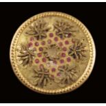 A set of ten Louis XV gilt metal and pink foil buttons, decorated with cannetille and applied