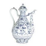 A Chinese blue and white porcelain ewer in Ming style, painted with flowers and ducks, with lid,