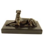 A 19th century bronze greyhound card holder, with an articulated jaw and on a black marble base, 8.