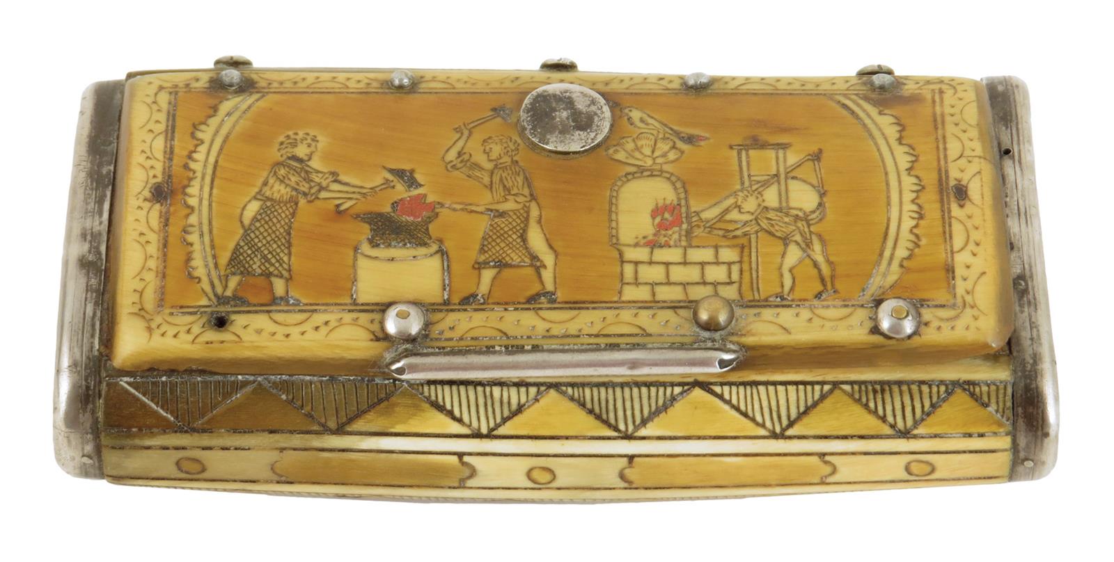An engraved horn and white metal mounted snuff box, the hinged lid decorated with a blacksmith's