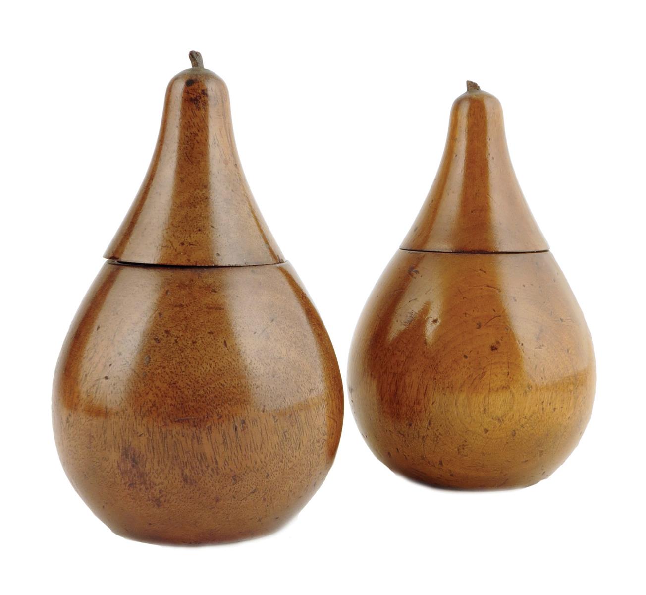 Two treen fruitwood boxes in the form of pears, each with a hinged lid, 12.8cm high. (2) Provenance: