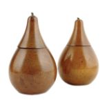 Two treen fruitwood boxes in the form of pears, each with a hinged lid, 12.8cm high. (2) Provenance: