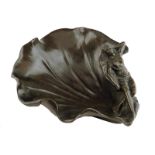 A French Art Nouveau bronze leaf shape dish, modelled with a reclining female figure, signed 'E.