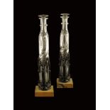 A pair of Louis Philippe bronze and Siena marble bottle holders, with Gothic tracery, each