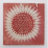 A William De Morgan ruby lustre Sunflower tile, painted in ruby on a white ground unsigned, light