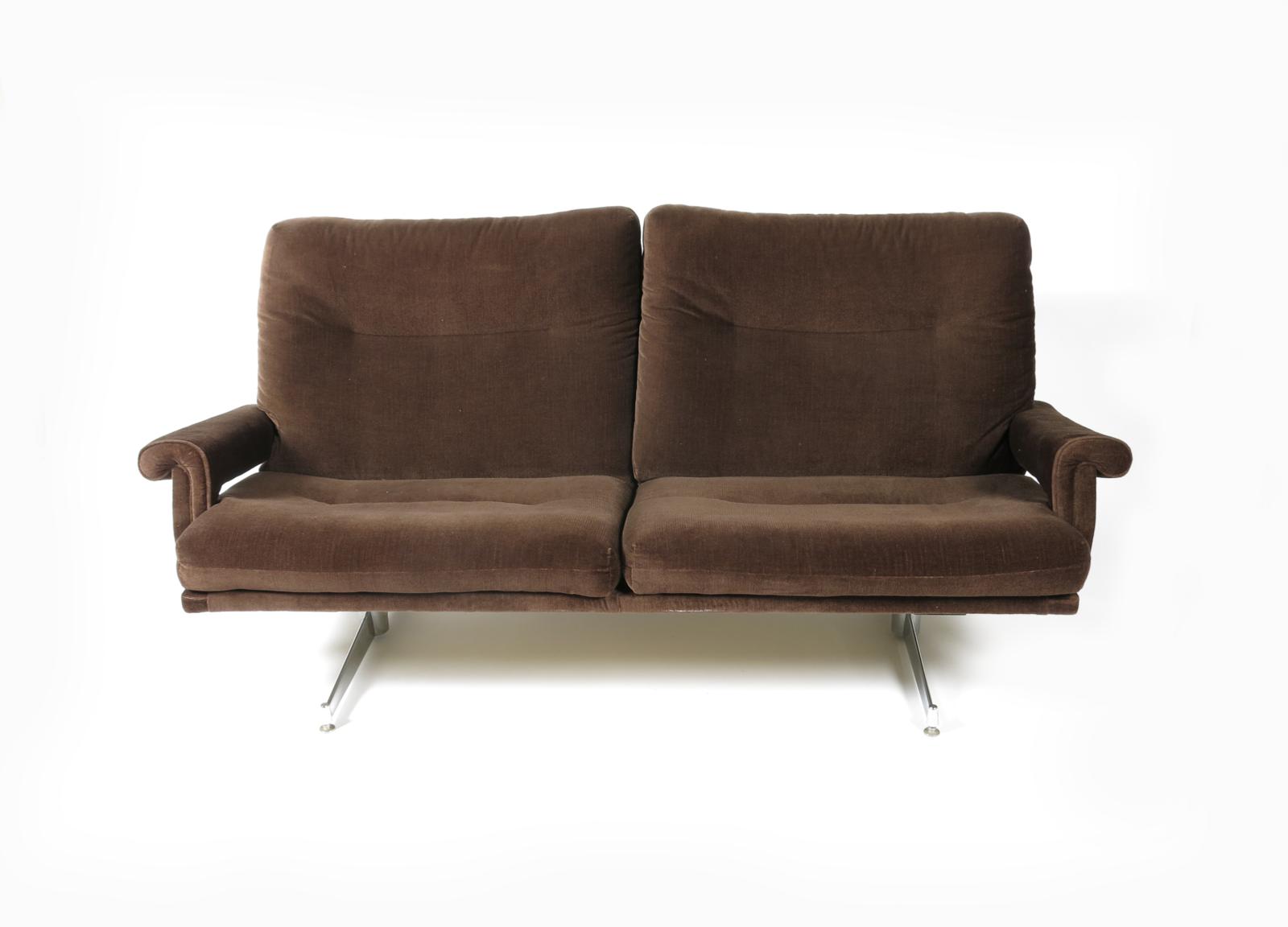 A HK furniture two seat settee designed by Howard Keith, chromed metal frame with padded seats and