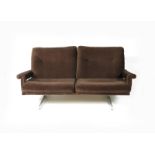 A HK furniture two seat settee designed by Howard Keith, chromed metal frame with padded seats and