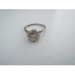 A single stone diamond engagement ring, claw-set with an old brilliant-cut diamond weighing