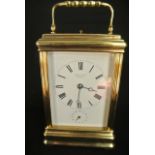 A French brass carriage clock, set in a gorge case with an 8 day striking movement stamped 20690