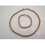 A 9ct gold necklace, composed of fancy links, with a matching bracelet, 33.4g in total (2)