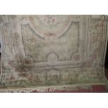 A cotton carpet in the aubosson style with floral detail upon a beige ground 200 x 320