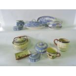 A collection of blue and white ceramics including a crescent shaped supper dish and cover by