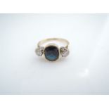 A sapphire and diamond ring, centred with a cushion-cut sapphire weighing approximately 3.03cts,