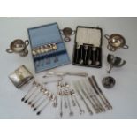 A miscellaneous collection of English silver, Birmingham, 1921-1937, comprising: a cigarette box and