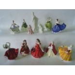 A collection of ceramic figures including Royal Doulton Pretty Ladies series examples Kirsty, Elaine