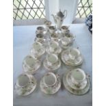 A collection of Paragon China coffee wares with printed floral border decoration comprising coffee