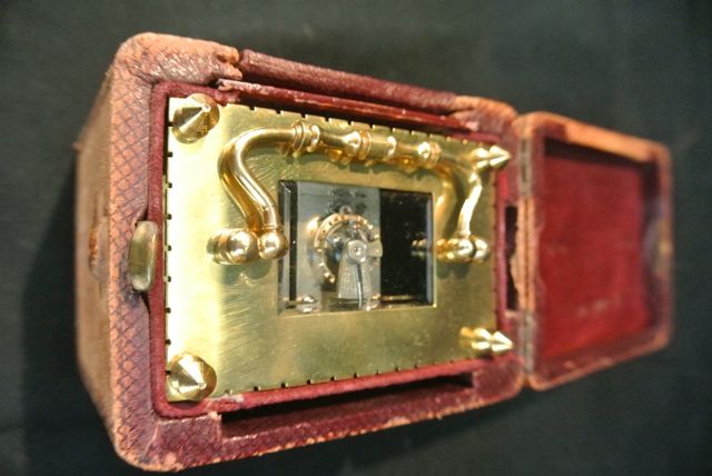 A French brass carriage clock, the case of square outline with enamel dial and 8 day timepiece - Image 2 of 2