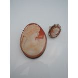 A 20th century cameo brooch, the shell carved with the profile of a lady, mounted in a silver frame,