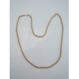 A 9ct gold necklace, composed of fancy links, with a matching bracelet, 10.5g in total (2)