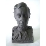 A Wedgwood black basalt bust of Prince Charles with a moulded title to the front and impressed