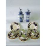 A collection of Coalport tea and dessert wares with blue, gilt and floral sprigged decoration