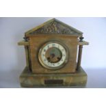An Edwardian onyx and brass mantle clock in the classical style with eight day striking movement,