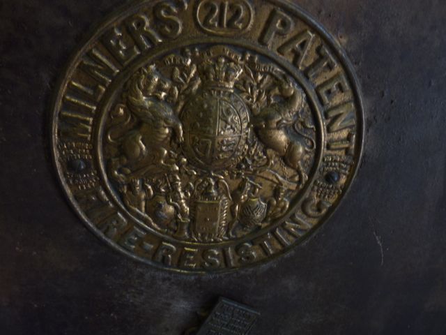 A large Milners patent fire resisting safe with circular embossed brass plate and partially fitted - Image 2 of 2