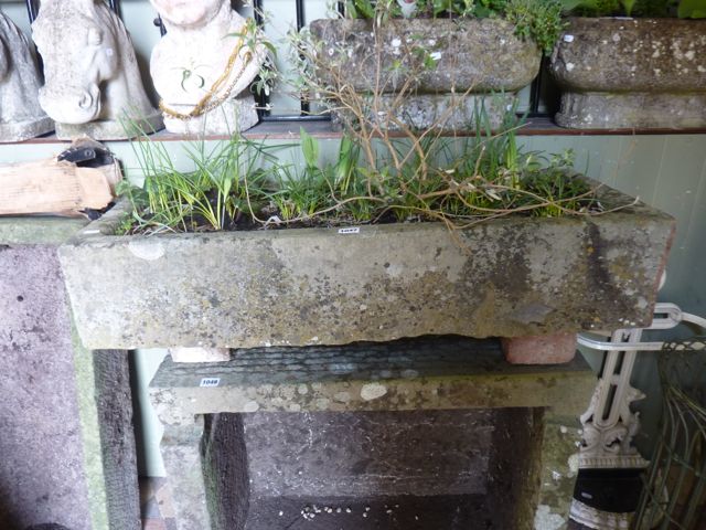 A 19th century limestone trough of rectangular form, 82 cm long x 40 cm wide x 18 cm deep