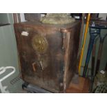 A large Milners patent fire resisting safe with circular embossed brass plate and partially fitted