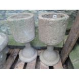 A pair of contemporary cast composition stone planters of unusual chalice shaped form