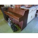 A contemporary Duck Son & Pinker Ltd iron framed and over strung piano with hardwood case