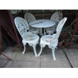 A Victorian style cast aluminium terrace set comprising circular top occasional table with