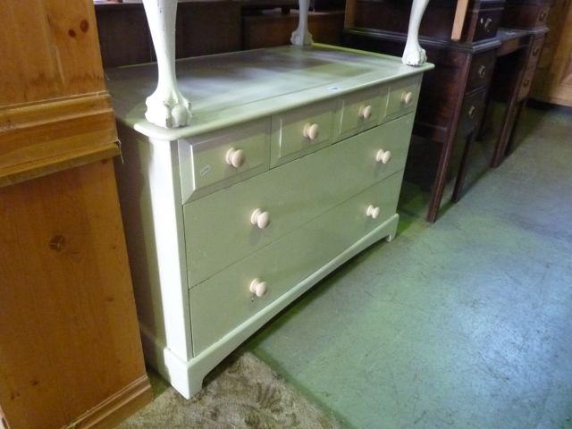 A Stag bedroom chest of two long and four short drawers with later painted finish