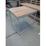 A good quality contemporary garden/conservatory occasional table, the square teak inset slatted