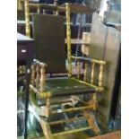 An Edwardian American rocking chair with ring turned bobbin frame