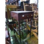 A 19th century mahogany occasional table of rectangular form with frieze drawer raised on slender