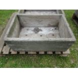 A weathered cast composition stone garden trough of rectangular form, 78 x 54 cm approximately