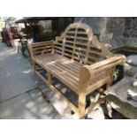 A good quality contemporary teak three seat garden bench in the Lutyens style