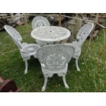 A Victorian style cast aluminium five piece terrace set comprising table of circular form with