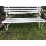 A sprung steel three seat garden bench with timber slatted seat and back and all over painted