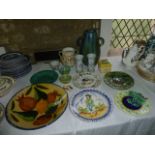 A collection of various tin glazed earthenware's including a pair of Portuguese vases with painted