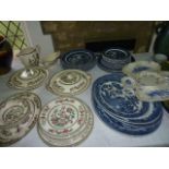 A quantity of early 20th century Bisto blue and white printed Willow pattern dinner wares comprising